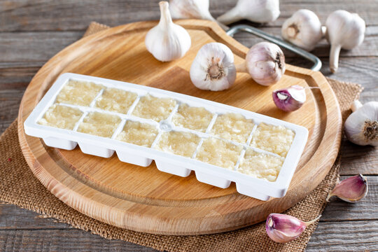 Frozen garlic. Frozen garlic puree on table. Frozen food Concept