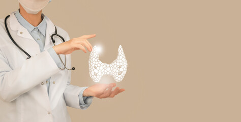 Unrecognizable doctor holding highlighted handrawn Thyroid Gland in hands. Medical illustration,...