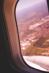 Naklejka premium Image of beautiful view from airplane window. Plane flight and view below.