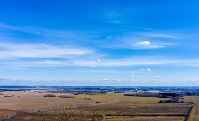Aerial view of agricultural landscape with fields in spring season.