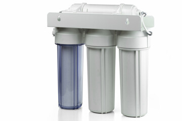 Three stage home water filtration system isolated on a white.