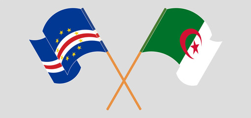Crossed and waving flags of Cape Verde and Algeria