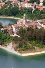 Beautiful landscape of small old town with beautiful lake MERCATALE MARCHE ITALY AT SUMMER