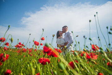 love and romance. opium. bride and groom on spring wedding. lovers in flower field.