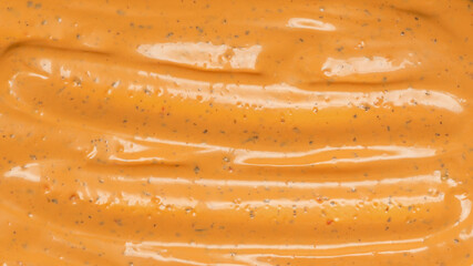 Whipped delicious sauce texture. Hamburger sauce background.