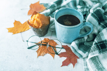 Autumn flat lay with a blanket, hot chocolate and a cake