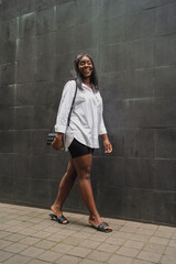 black girl walking on the street