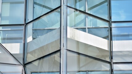 Modern architectural details. Modern glass facade with a geometric pattern
