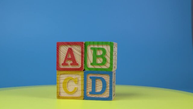 ABCD block rotate on surface. Child education brain concept