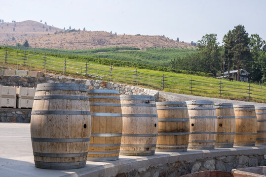 Wine Barrels At A Winery In Eastern Washington State On A Sunny Summer Day.