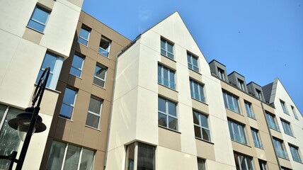 Detailed view of modern townhouses in row of. Original townhouses in a residential area. Buildings predominantly made of glass, steel and concrete.