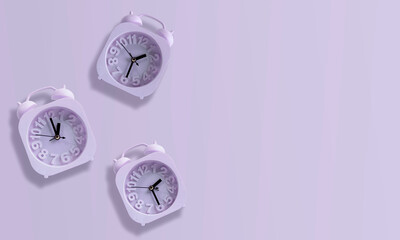 Purple Clock Isolated On Pastel Purple Background. 01:30 Hours, 01:00 Hours, 02:30 Hours. Alarm Clock Purple