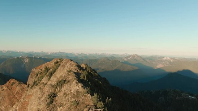 Aerial View of Rocky Canadian Mountain Landscape. Sunny Summer Evening. Sight from Mnt Brunswick, near Vancouver and Squamish, BC, Canada.