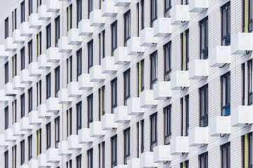 Exterior of the white new apartment building after construction.