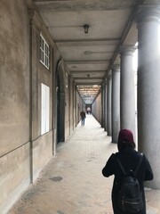person in a corridor