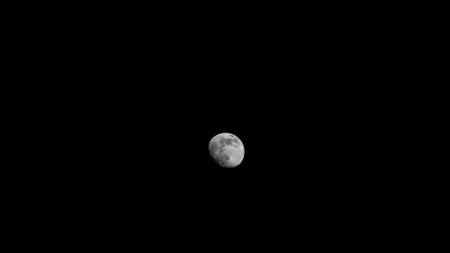 Moon on black, time lapse 4K, 