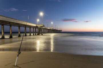 Obraz premium Fishing pole and Pier 