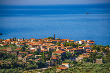 Naklejka na ściany i meble Aerial view of the wonderful seaside village of Kardamyli, Greece located in the Messenian Mani area. It's one of the most beautiful places to visit in Greece, Europe