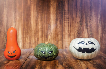 Pumpkins on wooden background