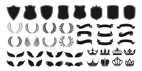 Fototapeta Heraldry vintage badge icon set. Blazon different crown shield, ribbon, wing and laurel wreath for coat of arms. Various decorative royal knight shields or emblems vector obraz