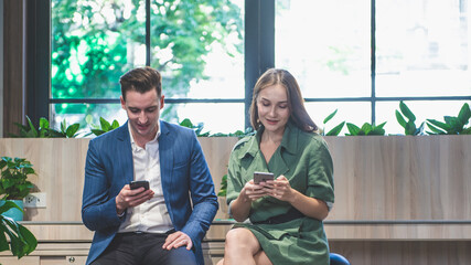 businessman and businesswoman caucasian working at Coworking space and for rent office,...