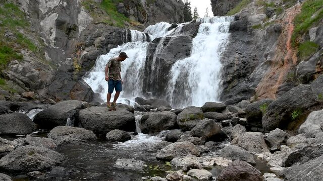 Hiker at Mystic Falls in Grand Teton National Park, Wyoming, USA