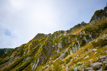 長野県上松町、木曽町、宮田村の木曽駒ヶ岳や千畳敷カールを登山している風景 Scenery of climbing Kiso Komagatake and Senjojiki Cirque in Uematsu Town, Kiso Town and Miyata Village, Nagano Prefecture.