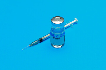 Medical hygiene syringe with needle incline on sealed glass capsule of transparent liquid as...