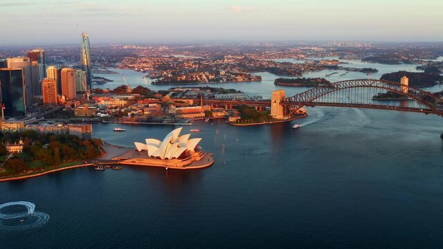 Panning Aerial View of Port Jackson Bay with Harbour Bridge and Sydney Opera House