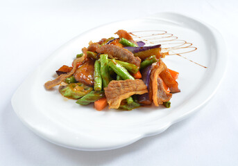 stir fried mixed vegetables with meat in spicy samba chilli sauce in white background asian halal menu