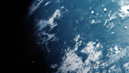 A cinematic rendering of planet Earth during sunrise as view from space with vibrant blue atmosphere and cloudy sky showing continents below