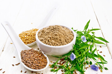 Flour linen in bowl with seeds on light wooden board