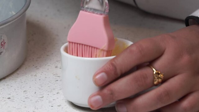 using butter from bowel with spatchula.