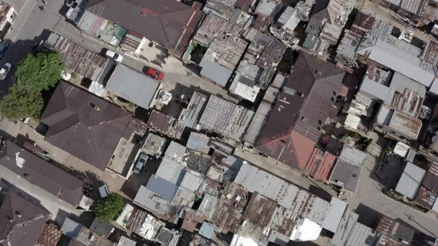 Medium Arial shot looking down at the tin roof huts of Alexandra, a township in Johannesburg,  South Africa.  It is known as Alex or Gomora among locals.