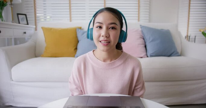 POV screen front view of asia people teen girl sit relax smile cheerful at sofa enjoy talk share in job experience in MBA school tutor class. Greeting waving hand lady look at camera meeting on web.