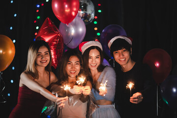 2021 to 2022 new year celebration party event with Asian young girl people who happy and fun together in a club, Asian women group in night light festival, lifestyle on stage show at nightclub