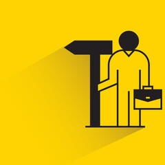 businessman with guidepost icon on yellow background