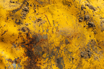 yellow metal rusty surface texture in scratches with traces of oil and petroleum products