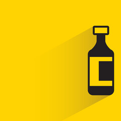 bottle with shadow on yellow background
