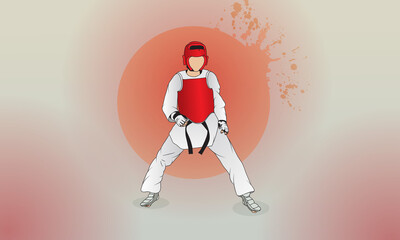 A young fighter in a taekwondo fighting stance.