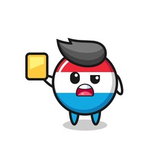 cartoon luxembourg flag badge character as a football referee giving a yellow card
