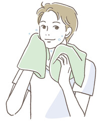 タオルで顔を拭く男性