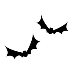 空飛ぶコウモリのシルエット