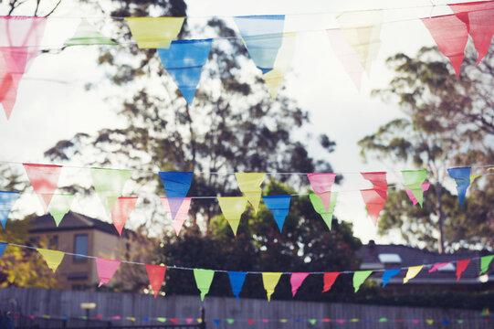 Rainbow flags at backyard party