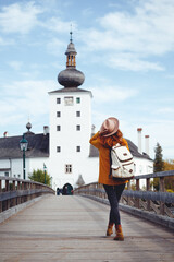 girl goes over the bridge to the castle ort