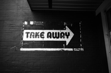 Take away sign on a wall