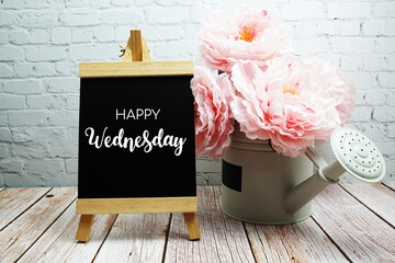 Happy Wednesday typography text on easel wooden board