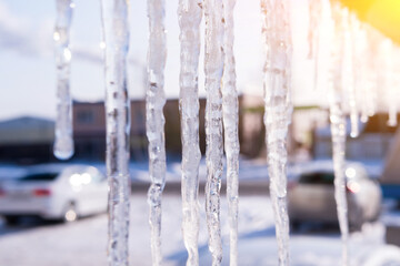 Covered with ice and icicles after freezing rain. Winter frosty scenes. Selective focus