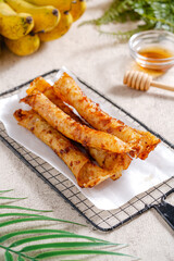 Piscok or banana chocolate is  traditional snacks from Indonesia. made of fried banana wrapped in spring roll skin.