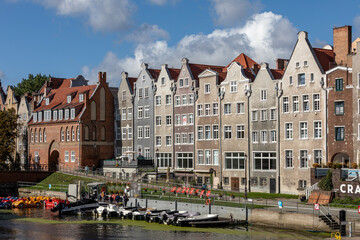 Naklejka premium Gdansk, Old Town - historic tenement houses with gables along Motlawa riverbank, Poland